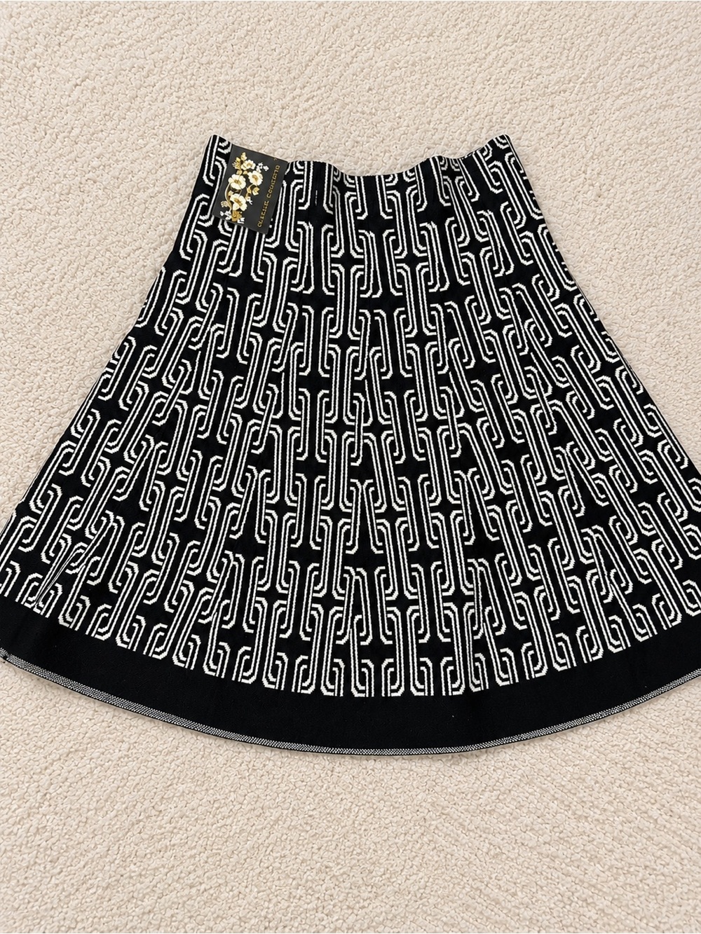 Black & White Patterned Midi Skirt โ Elegant Geometric Knit